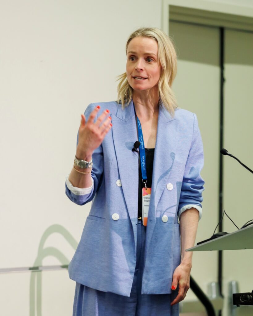 Kirsten Siggins speaking at leadership conference Institute of Curiosity